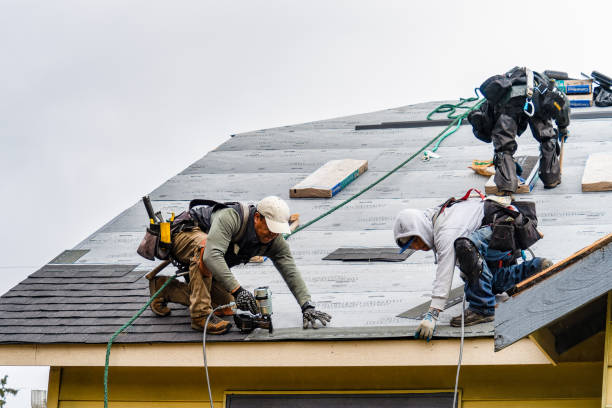 Professional Flat Roof Repair technician working in Cumberland, WI